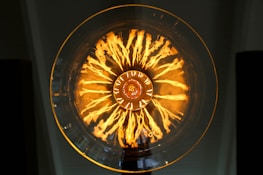 Innovative lightbulb composed of interconnected lines and dots.