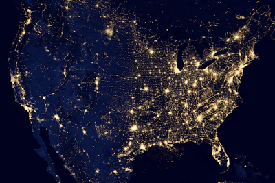 A global map with illuminated connections between Saudi Arabia and the USA, illustrating our international network.
