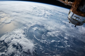 view of Earth and satellite