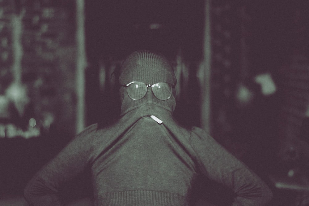 man in black vest and black sunglasses