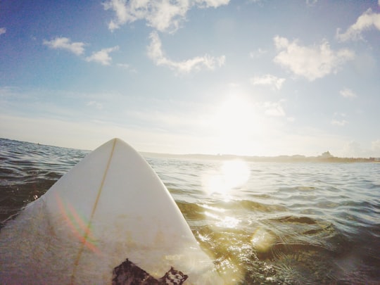 person riding a surfboard in Peniche Portugal