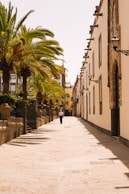 man walking on side walk