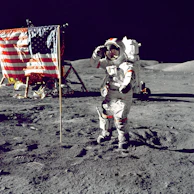 A smiling astronaut waving goodbye from a rickety ladder on the moon's surface.