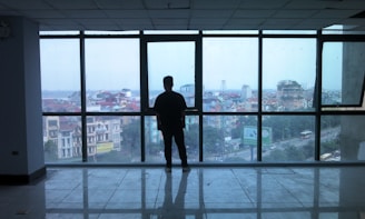 Spacious downtown condo with floor-to-ceiling windows overlooking the city skyline.