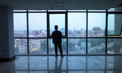 Spacious downtown condo with floor-to-ceiling windows overlooking the city skyline.