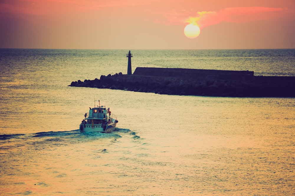 white tugboat on calm waters