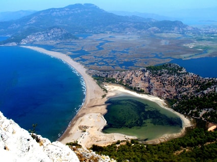 aerial view of seashore and mountains