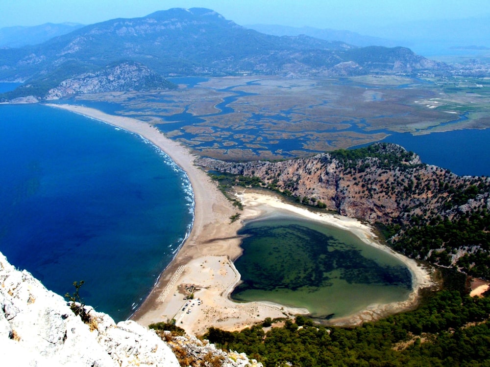 aerial view of seashore and mountains