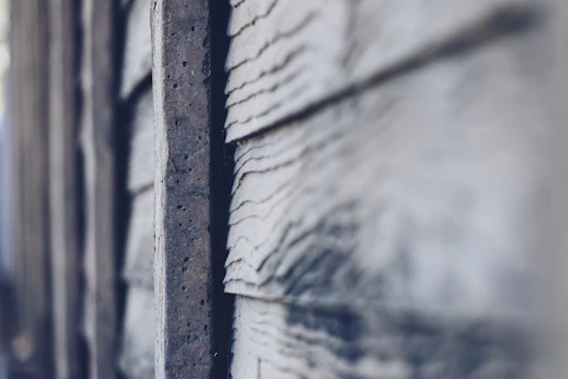 Close-up of elegant architectural finishes blending natural wood and concrete textures.