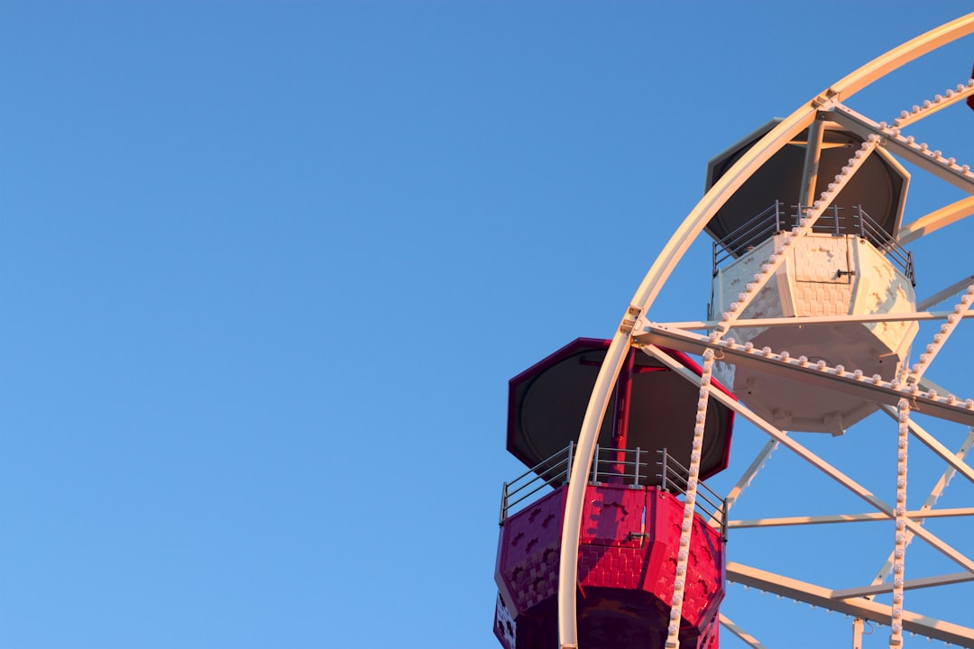 beige and red ferris wheel