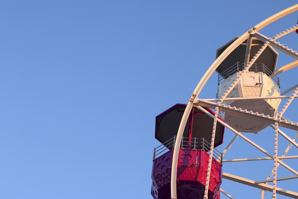 beige and red ferris wheel