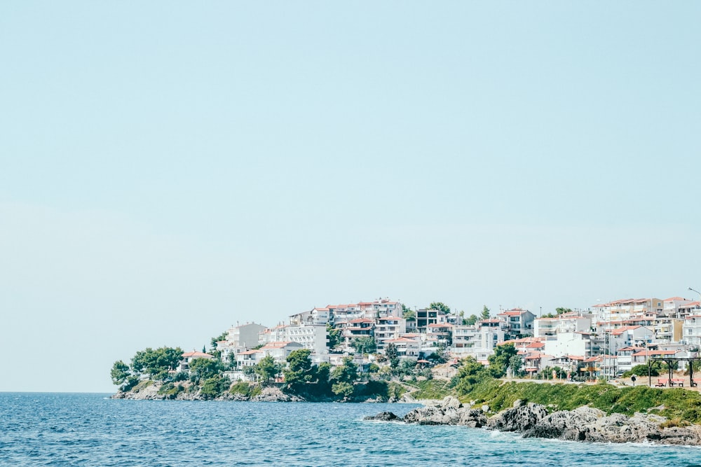 high rise buildings near cliff