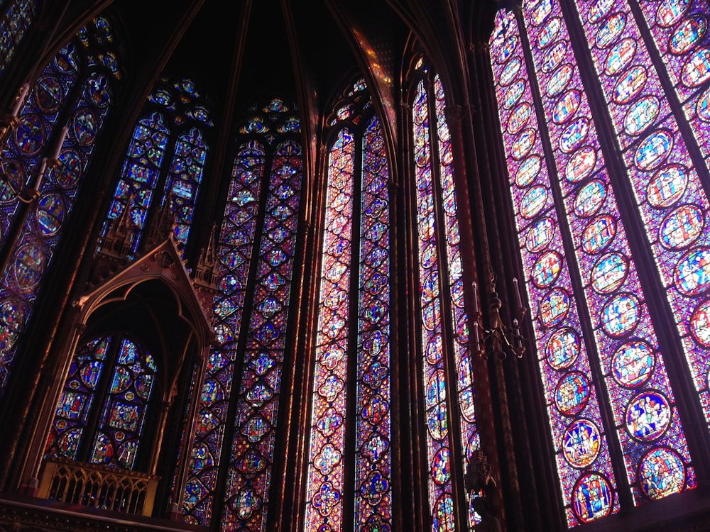 purple stained glass of cathedral