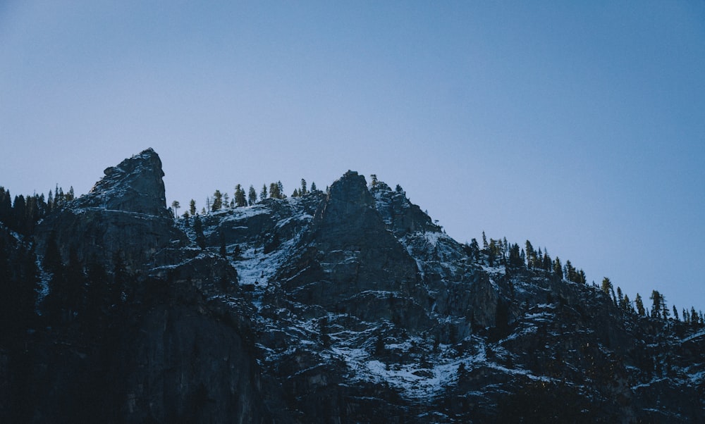 landscape photography of mountain under blue sky