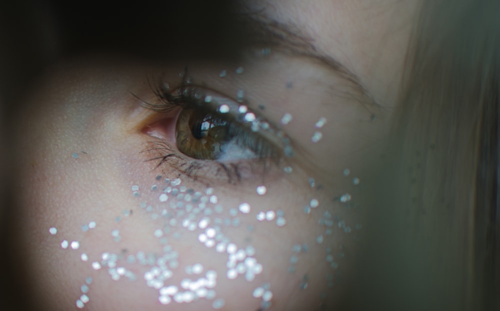 closeup photo of woman's left eye