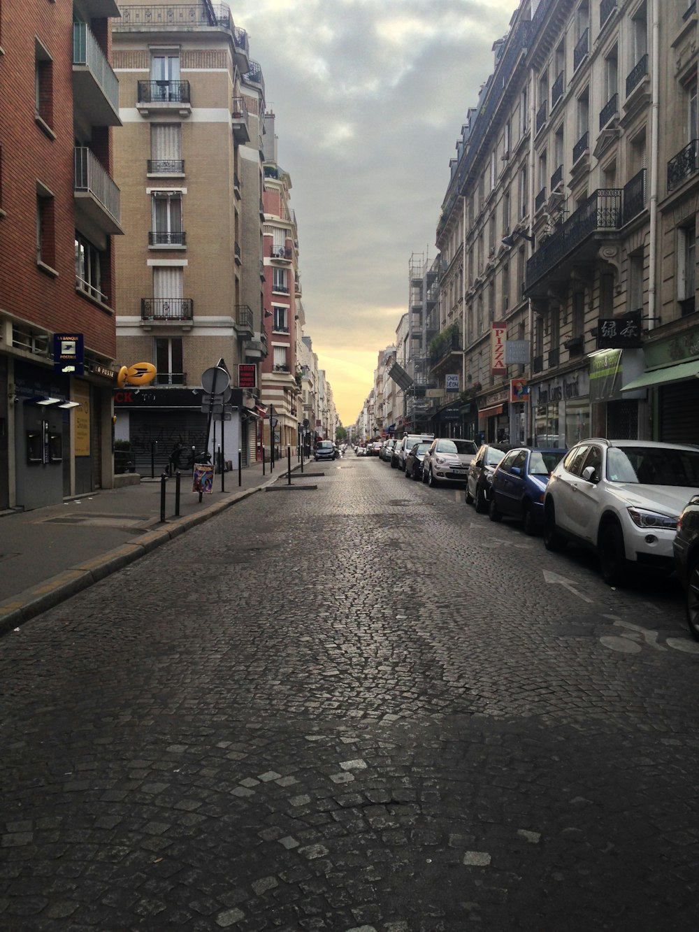 road street between two buildings