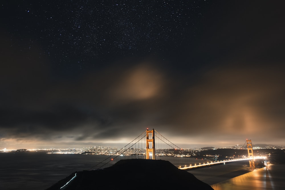 golden bridge during night time