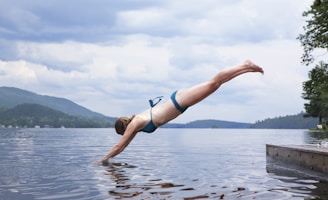 woman diving on water