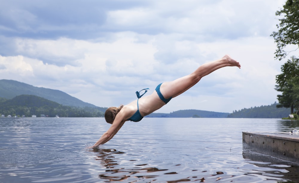 woman diving on water