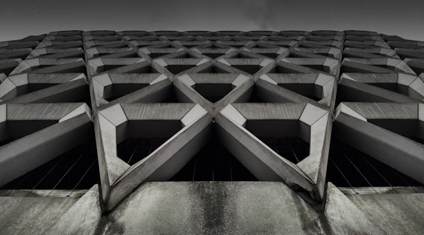 gray concrete building low-angle photography