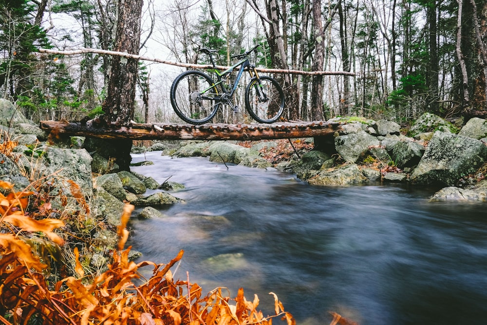 bicycle parked on bridge