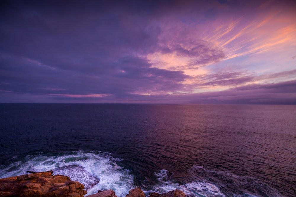 time lapse photography of body of water