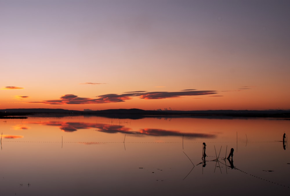 body of water during golden hour