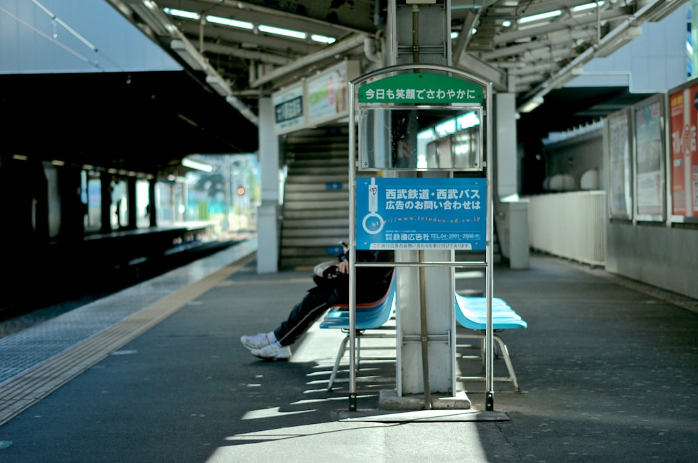 person waiting on the train in the subway