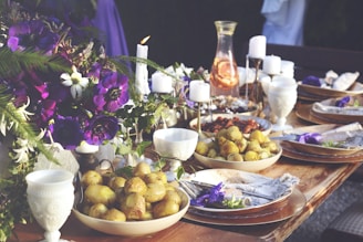 A beautifully arranged table with a variety of dishes and elegant tableware.
