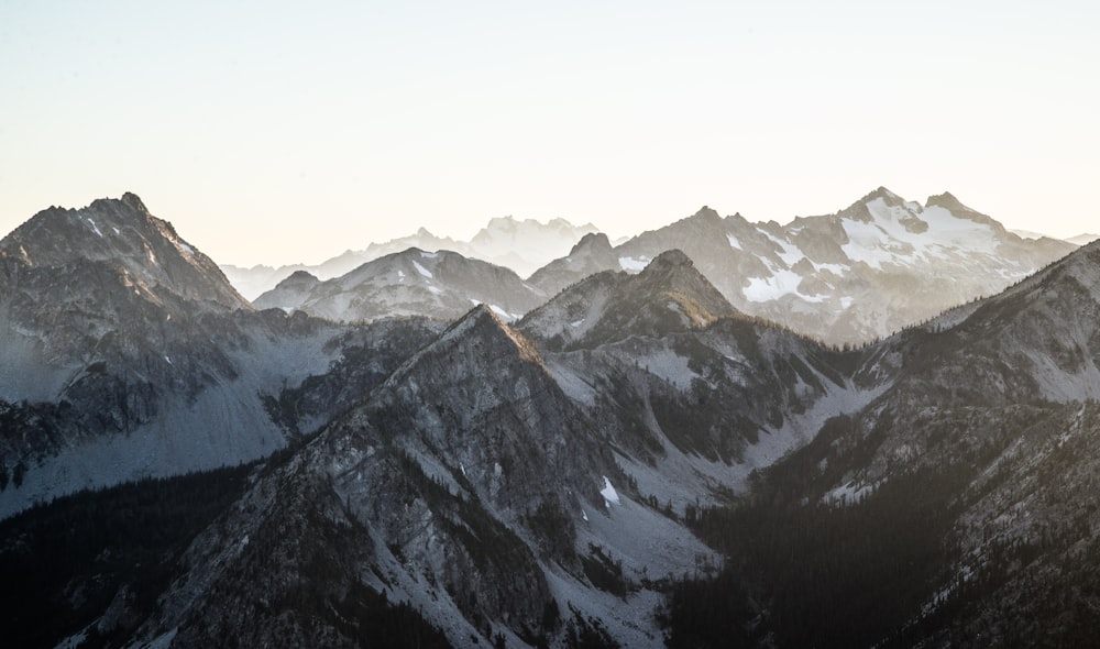 snow covered brown mountain during daytime