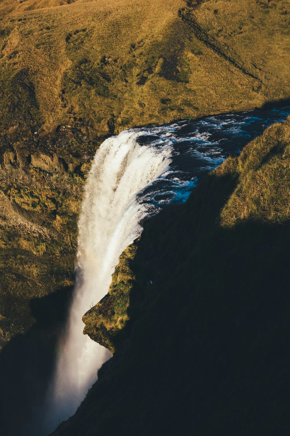 aerial photography of waterfalls at daytime