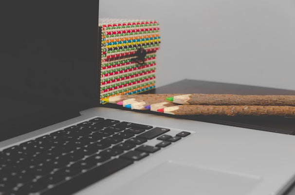 A close-up of a laptop screen showing a blog post draft about language learning tips.