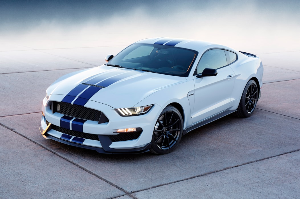 white and blue ford mustang