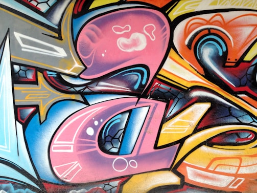 A dynamic shot of a colorful mixed-media artwork blending modern shapes and textures.