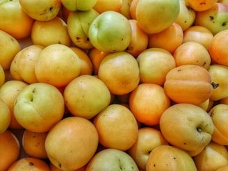 Bright green packaging with succulent dried apricots spilling gently from the bag.