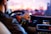 man driving a car wearing wrist watch
