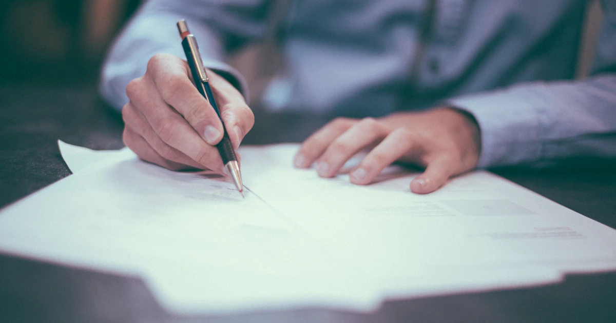 Legal compliance documents on a desk — GDPR Article 30 requires written records of all personal data processing activities including AI tools