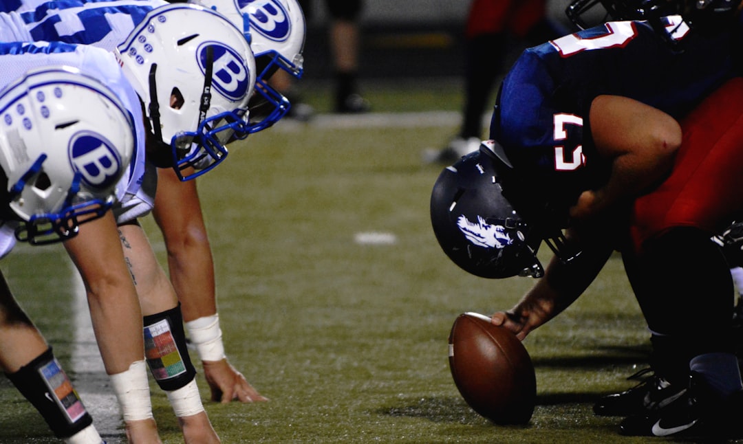 NFL player setting game, football players on field