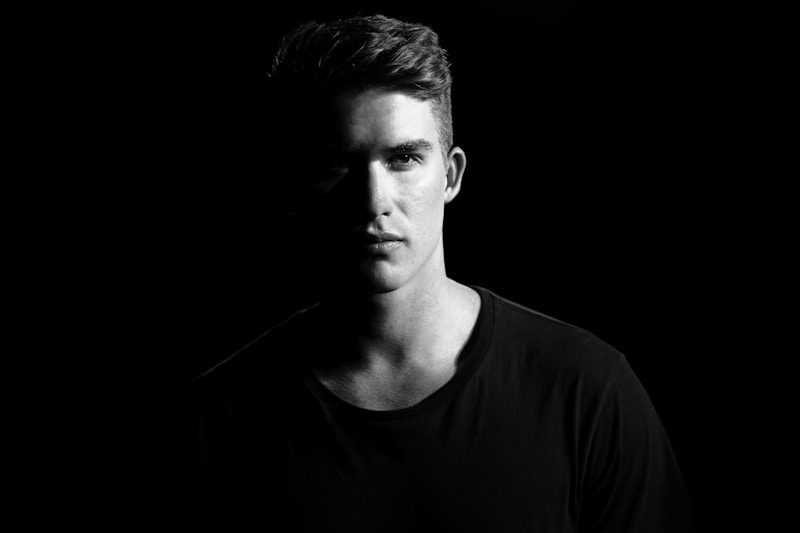 Man in white shirt black and white portrait