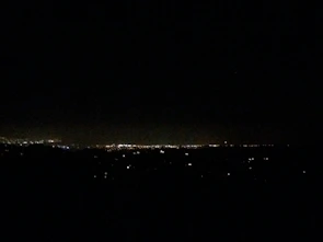 A city map dotted with multiple verified business markers glowing softly.