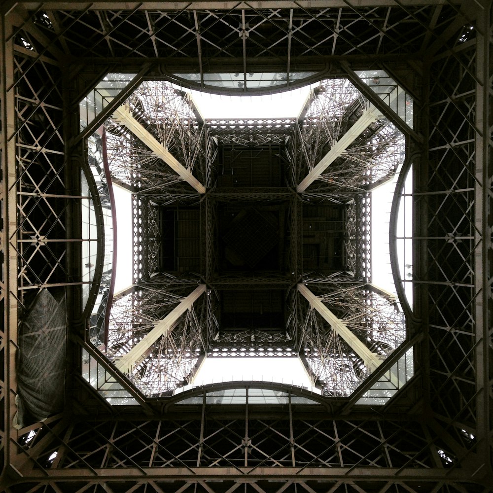 worm's eye view photography of steel structure