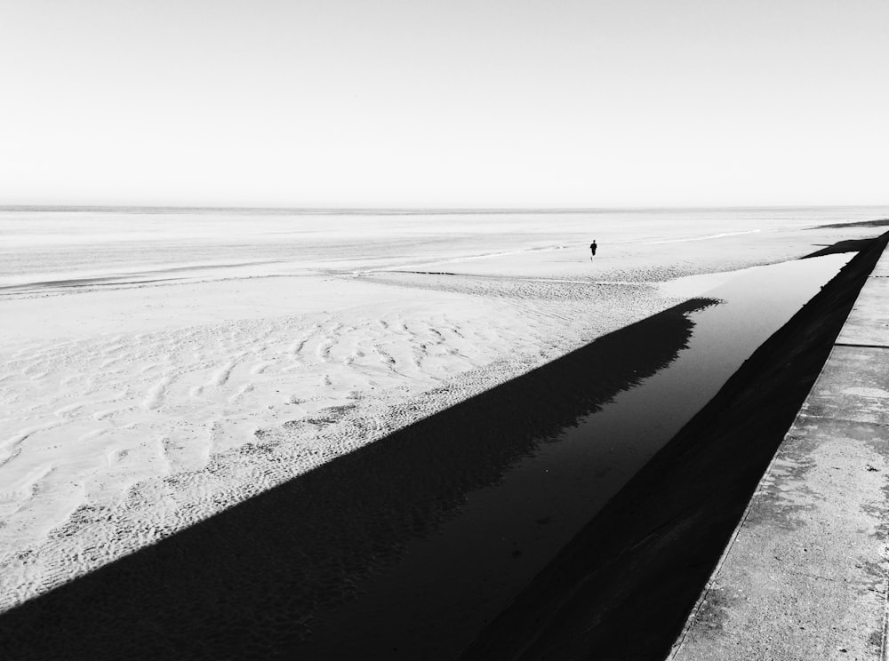 person walking on snow during daytime