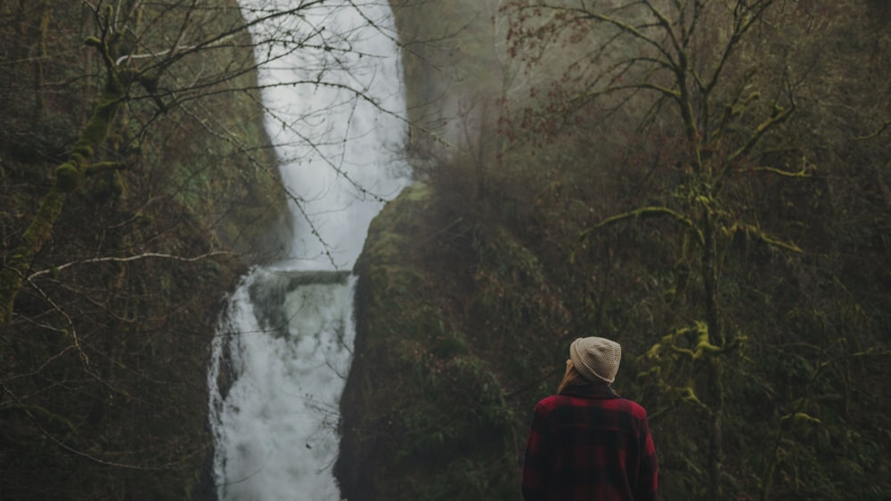 woman looking at the waterfalls