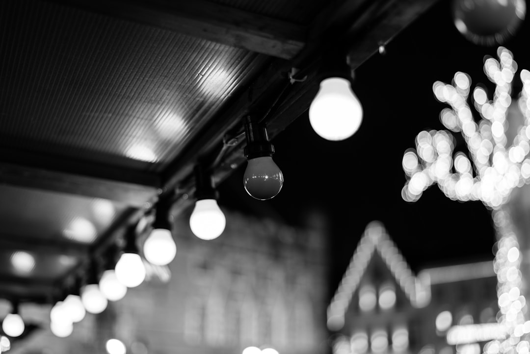 greyscale photography of light bulbs