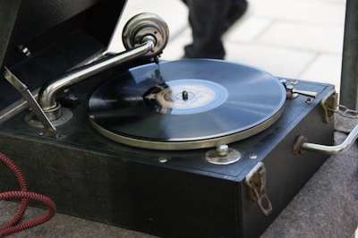 A vintage vinyl record spinning on an old turntable.