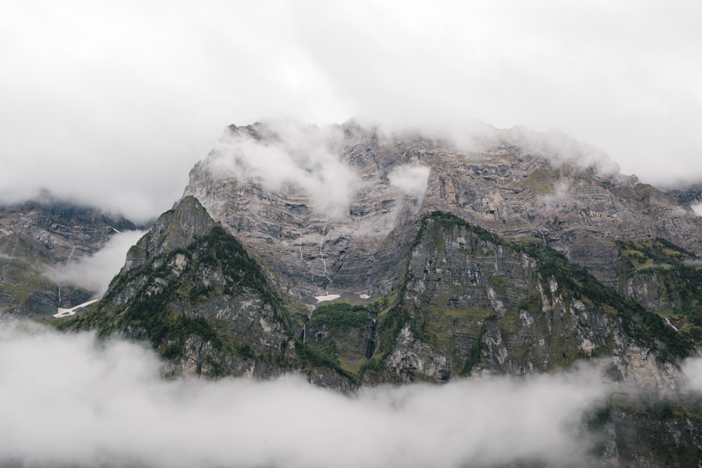 mountain covered by clouds