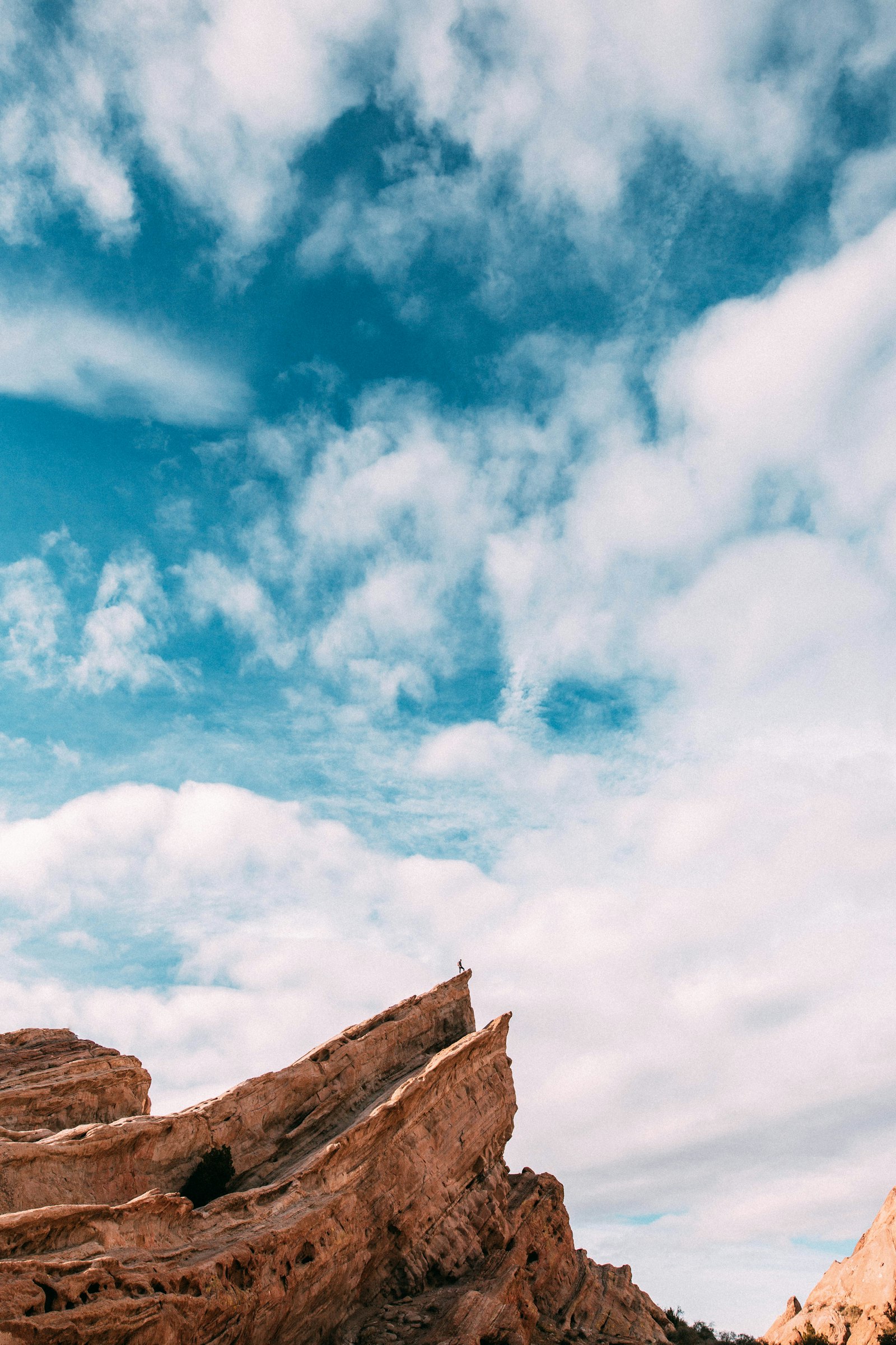 Sigma 24mm F1.4 DG HSM Art sample photo. Person standing on mountain photography