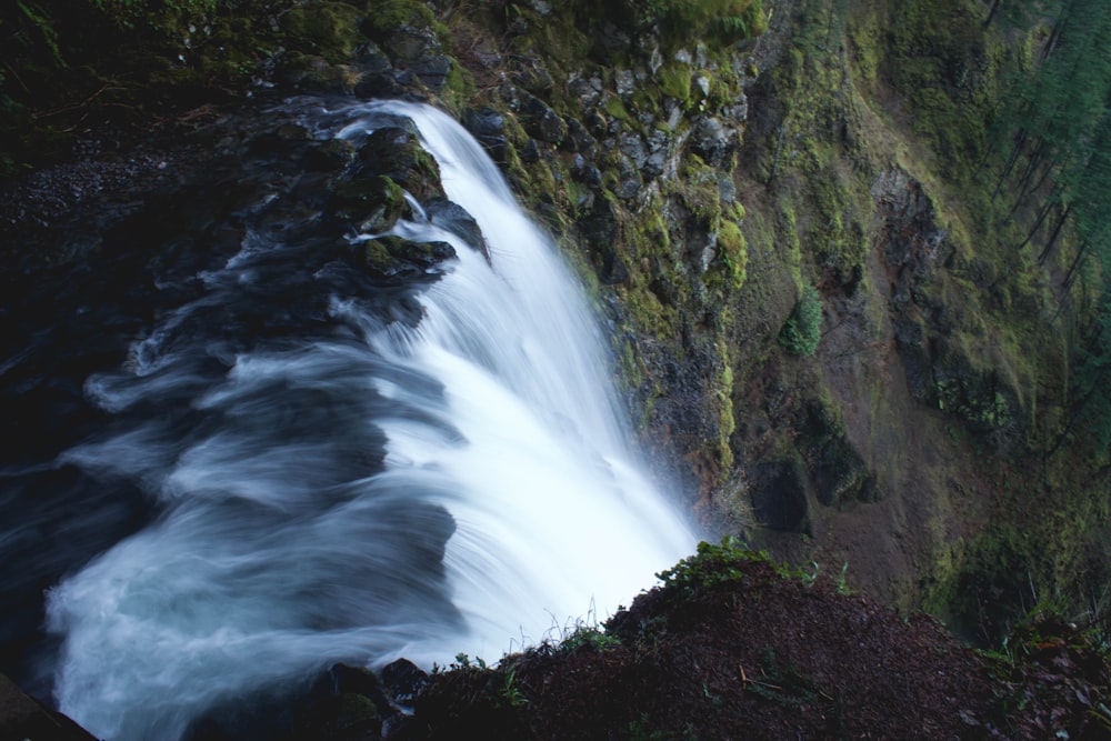 time lapse photography of waterfall