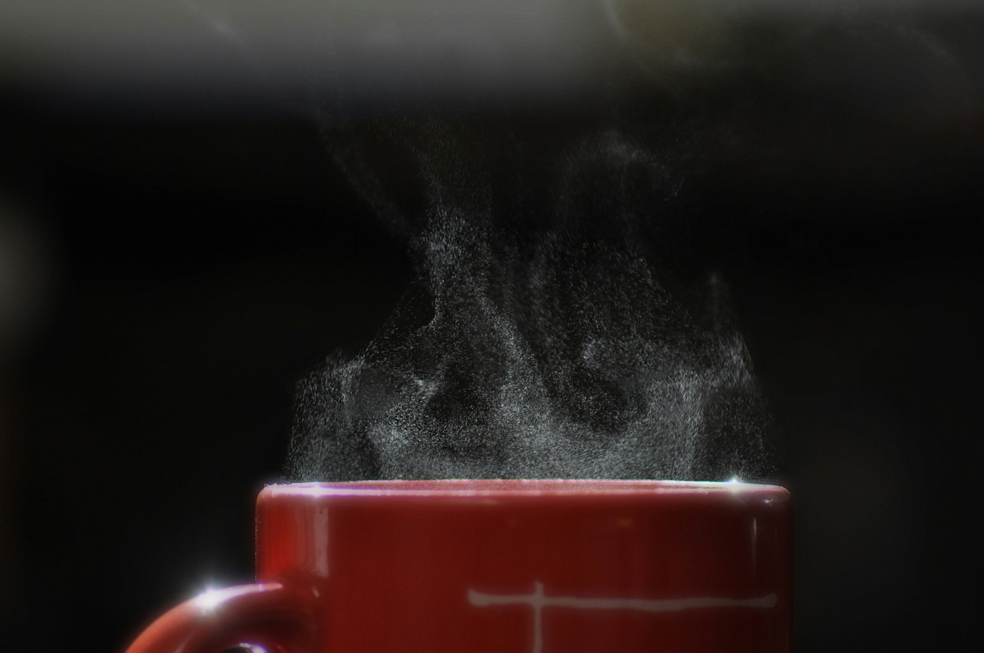 smoke coming out from mug filled with beverage