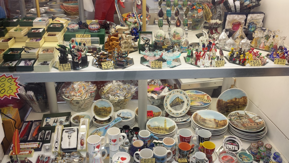 A vibrant display of personalized gifts including mugs and frames.